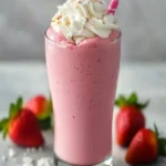 Pink Smoothie with Coconut Whipped Cream First Image First Image